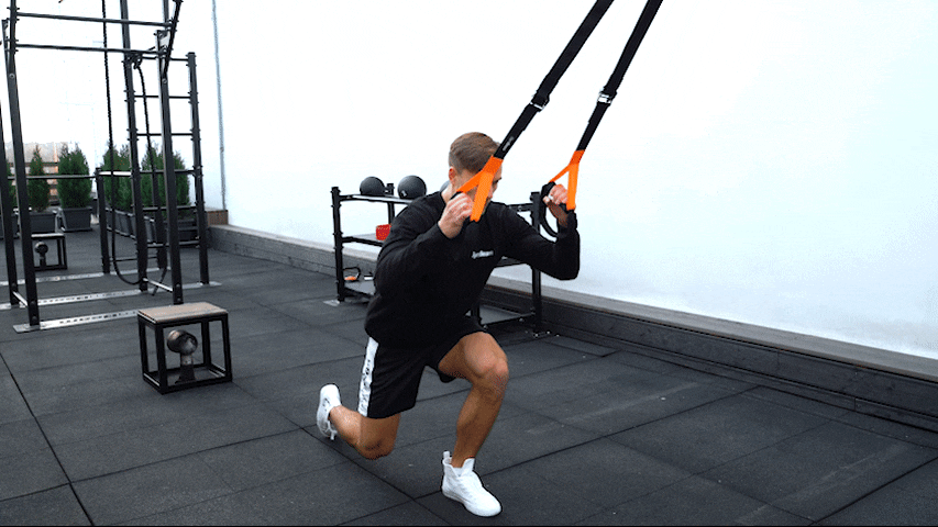 How to perform reverse lunges with TRX?