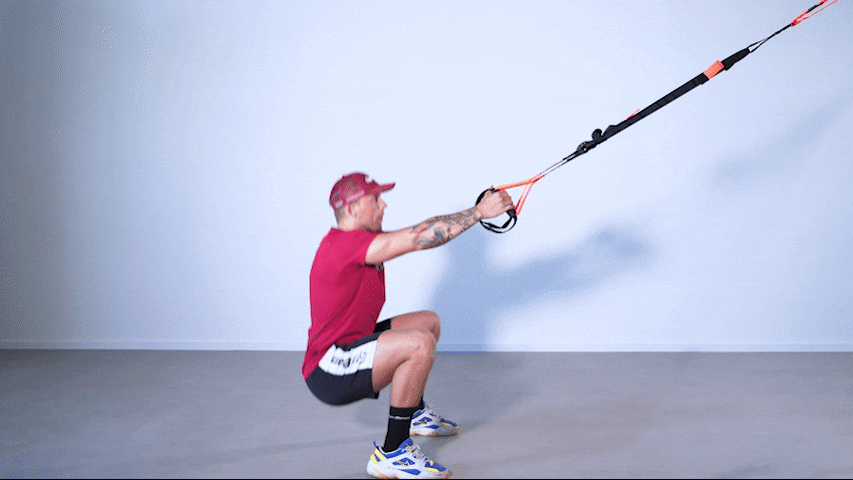 How to perform jump squats with TRX?