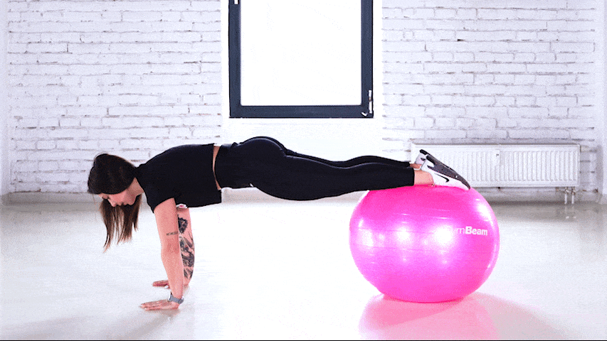 How to perform plank knee pull with the stability ball