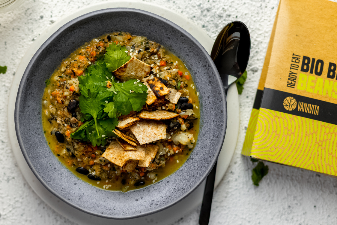 Mexican bean soup with coriander and crispy tortilla