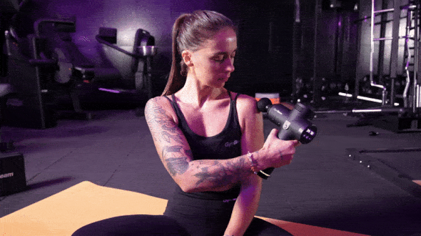 Masážna pištoľ na ramená