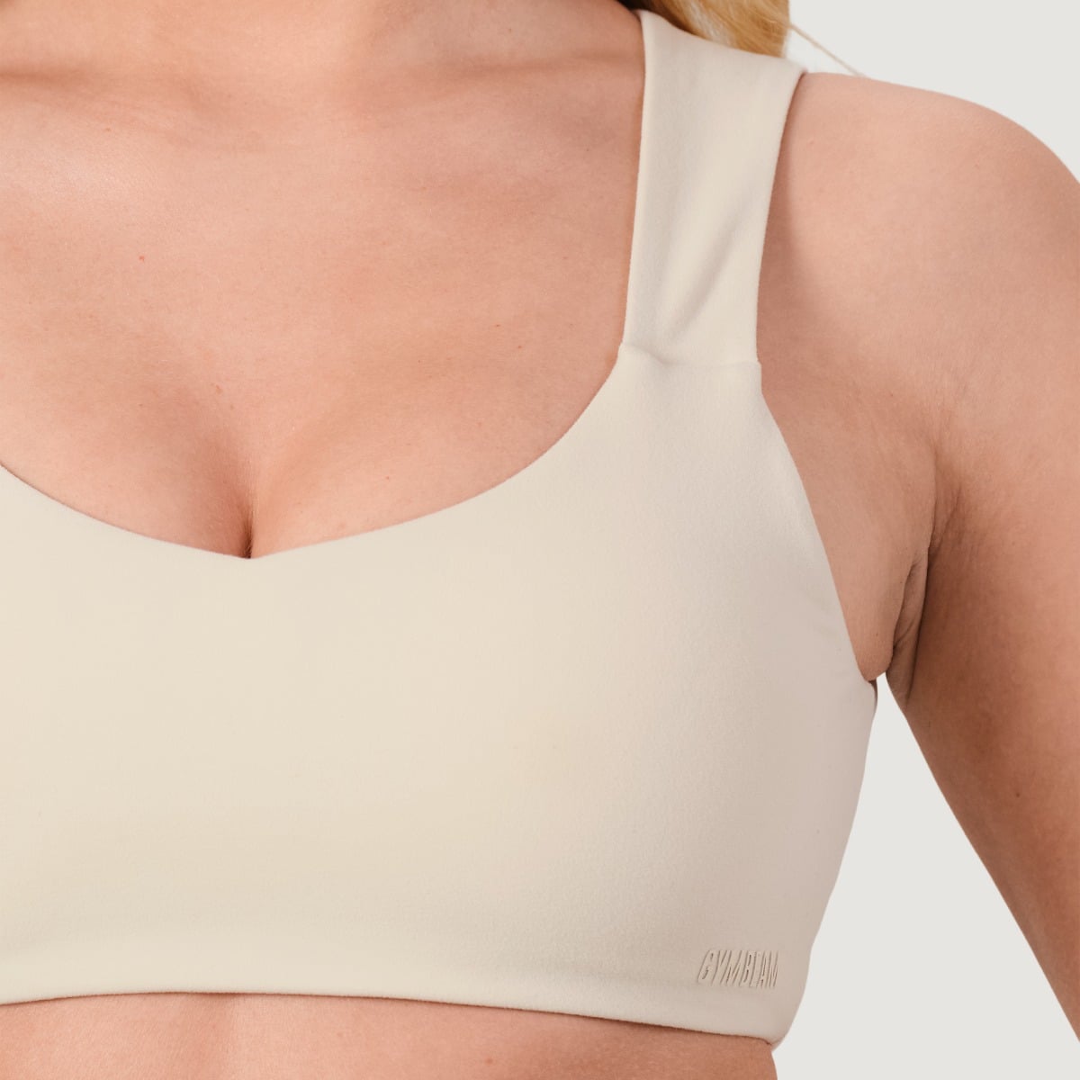 Sportovní podprsenka NEO Almond - GymBeam cream L