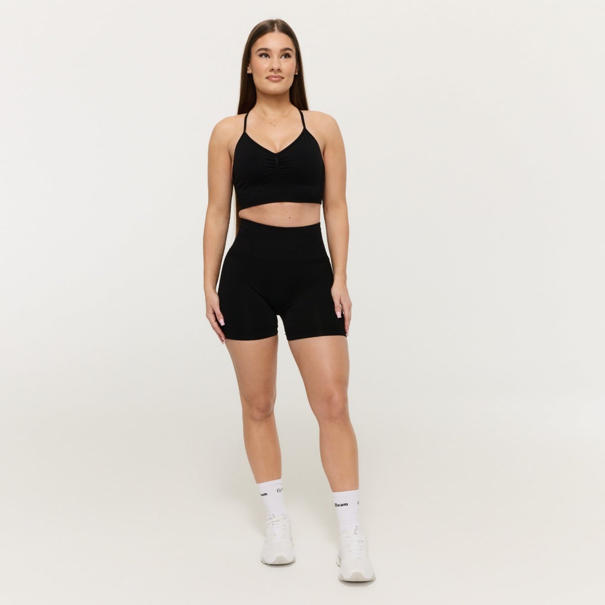 Bezešvá sportovní podprsenka Sculpt Black - GymBeam černá XL