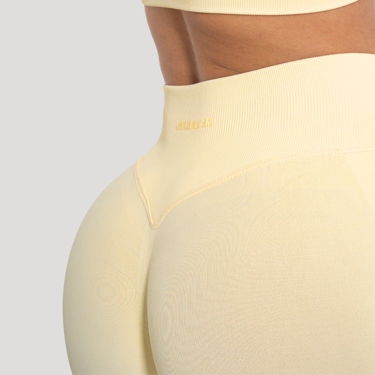 GymBeam Dámské Legíny Luma Butter Yellow - Velikost: M | Barva: Žltá | Hmotnost: 0,225 kg | Balení: 80 · záber 6